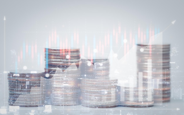 Double exposure of graph and rows of coins for finance saving banking business concept