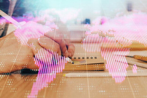 Photo double exposure of hands and notepad with business icons