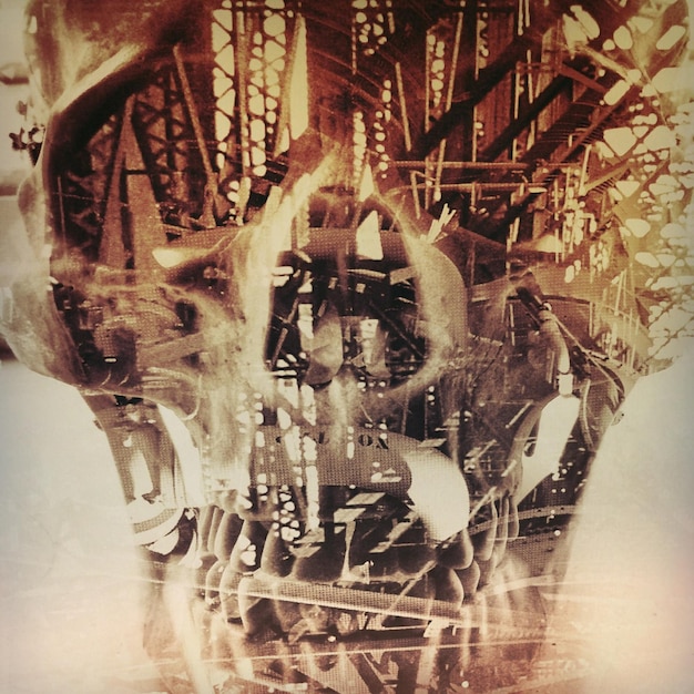 Photo double exposure image of human skull and building