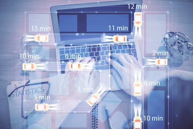 コンピューターのキーボード上で入力する人間の手と自動車のテーマのホログラム描画の二重露光上面図技術コンセプト