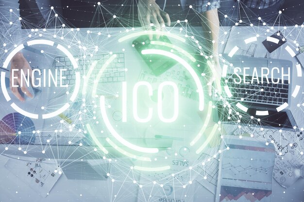 Double exposure of man and woman working together and crypto finance theme hologram Blockchain business concept Computer background