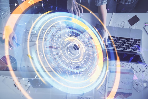 double exposure of man and woman working together and tech hologram drawing technology concept computer background