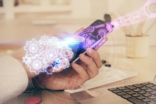 double exposure of mans hand holding and using a digital device and data theme hologram drawing technology concept