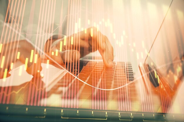 Double exposure of market chart with man working on computer on background Concept of financial analysis