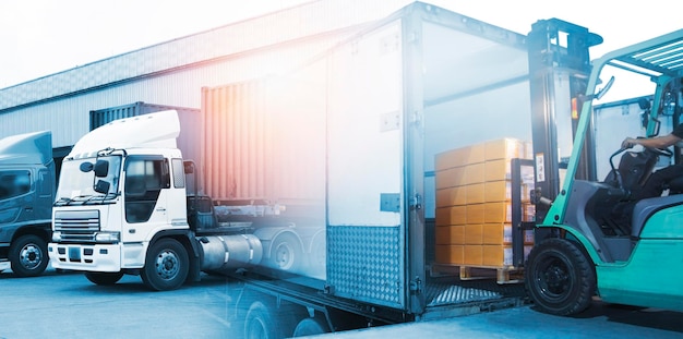 Double exposure photos of forklift tractor loading package
boxes trucks loading at dock warehouse