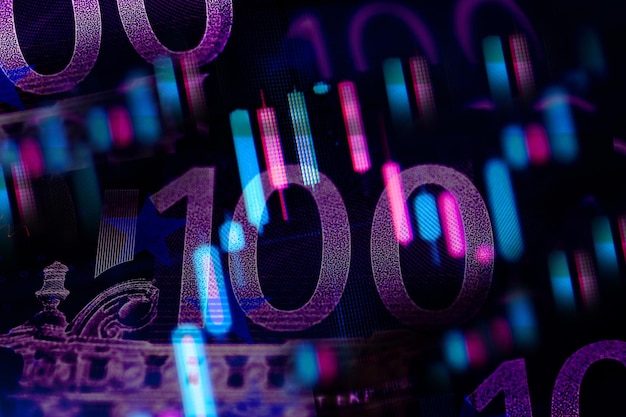 Double exposure Stock market display or forex trading graph and candlestick chart on Euro banknote. Economy trends background for business idea and all art work design. Abstract finance background.