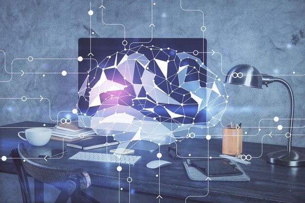 Photo double exposure of table with computer and brain hologram data innovation concept