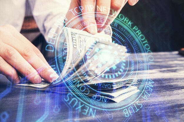 Double exposure of technology drawing hologram and us dollars bills and man hands Data concept