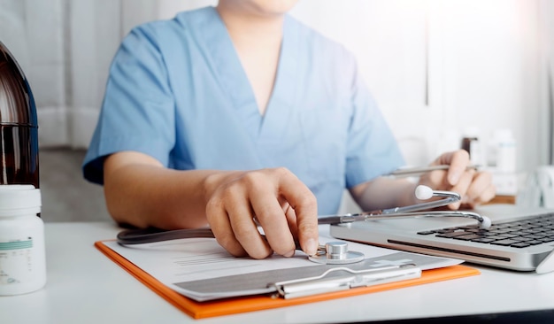 Double exposure of technology healthcare And Medicine concept Doctors using digital tablet and modern virtual screen interface icons panoramic banner blurred background