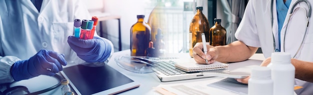 Double exposure of technology healthcare And Medicine concept Doctors using digital tablet and modern virtual screen interface icons panoramic banner blurred background