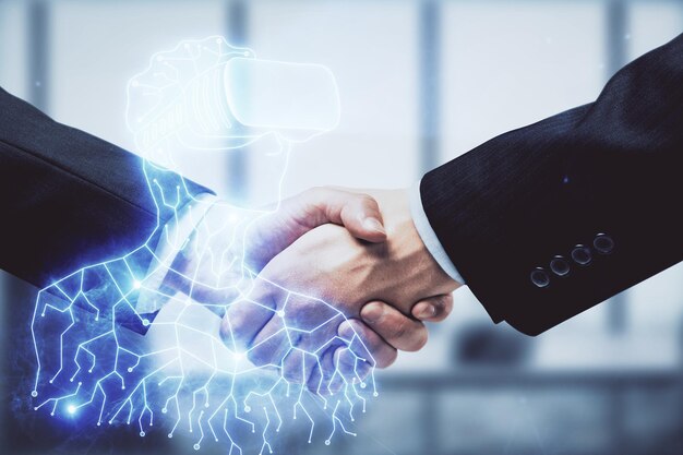 Double exposure of VR glasses drawings hologram and handshake of two men Partnership concept