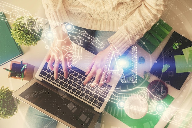 double exposure of woman hands working on computer and data theme hologram drawing top view technology concept