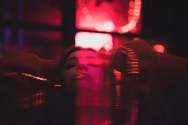 double exposure of woman and lights
