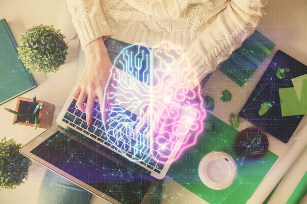 Photo double exposure of woman working on computer andhuman brain hologram drawing top view ai concept