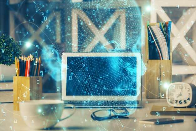 Double exposure of work space with computer and human brain drawing hologram Brainstorm concept