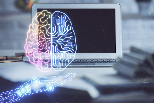 Double exposure of work space with computer and human brain drawing hologram Brainstorm concept
