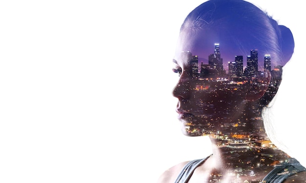 Double exposure of young woman and city view