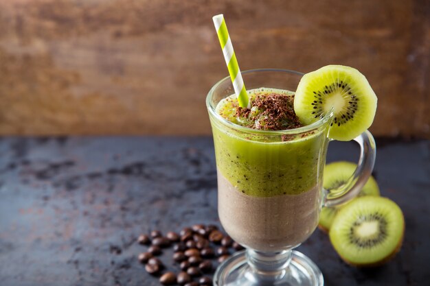 Double layer green smoothie of chocolate and kiwi