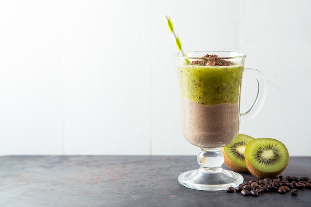 Double layer green smoothie of chocolate and kiwi