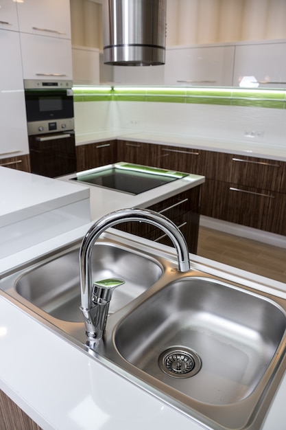 A double steel kitchen sink in a modern style