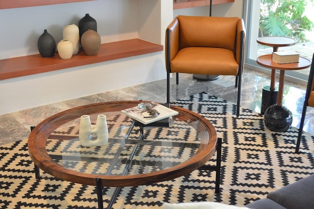 Double table in brown wood with circular metal edges and several glass shelves