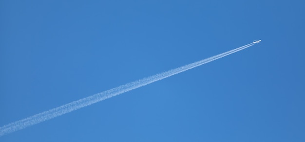 double track in the sky from a jet plane