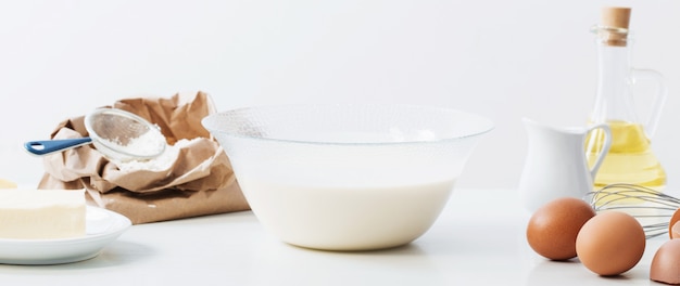 Dough in glass plate and products for its preparation on white