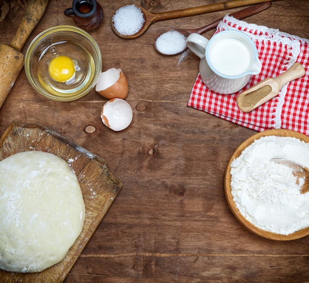 Dough made from white wheat flour and ingredients for cooking