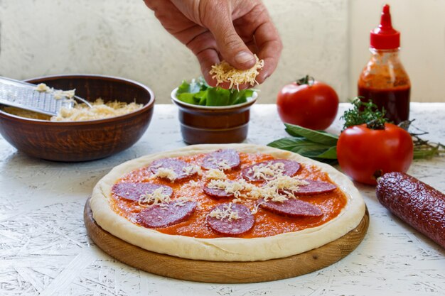 Dough. The process of making pizza. Ingredients for pizza