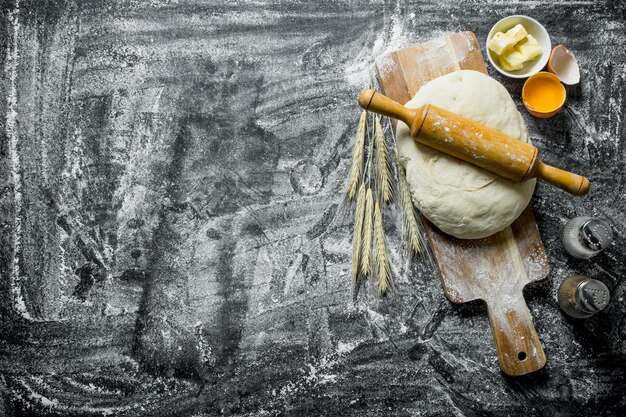 the dough with a rolling pin spikelets and spices