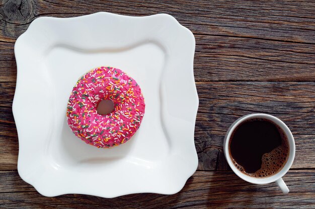 Doughnut and coffee cup