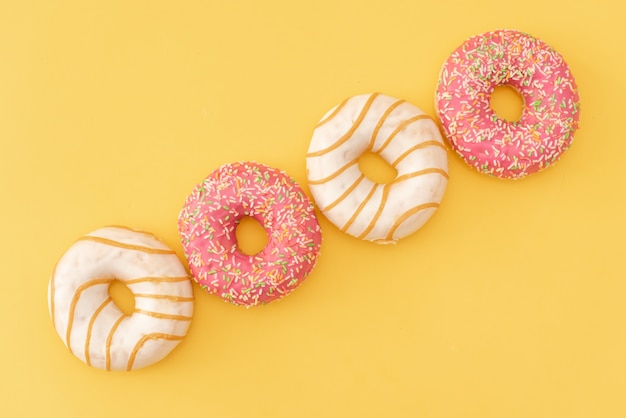 doughnuts on yellow  background. 