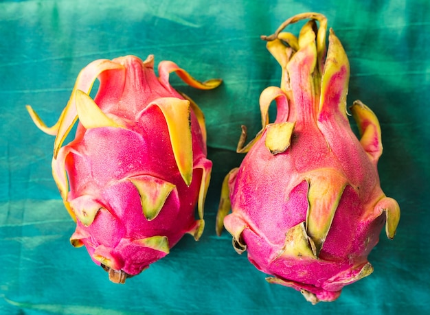 dragon fruit on a blue wall