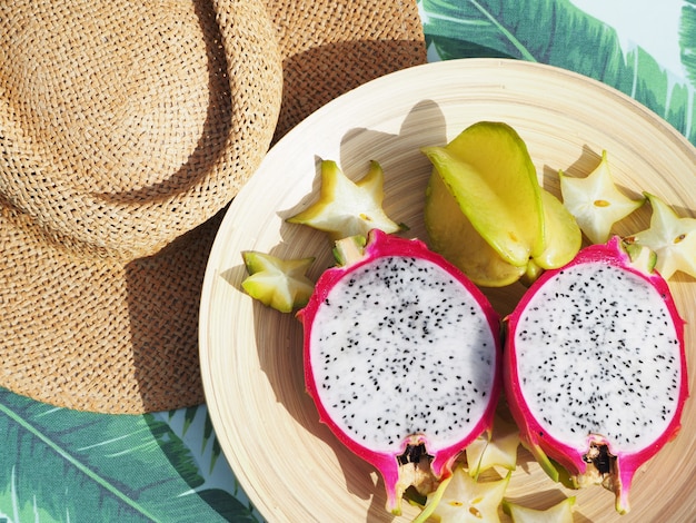 Dragon fruit and carambola cut on the table