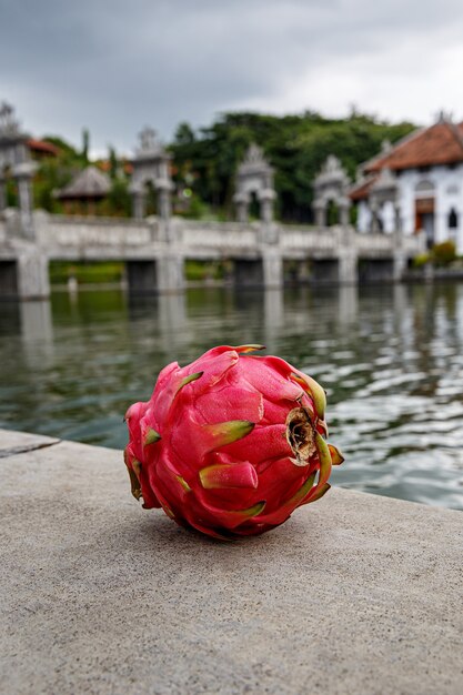 Dragon fruit on a stone.