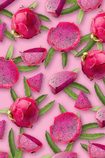 Dragonfruit with half wallpaper on pink background