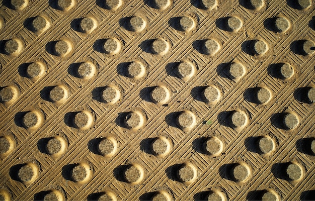 Foto fondo concreto drammatico di struttura dell'asfalto della città dei puntini