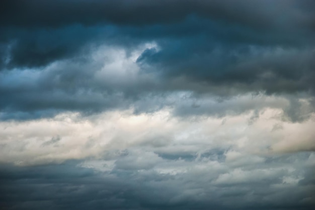 Dramatic moody sky ominous cloudscape thunderclouds in windy autumn sky