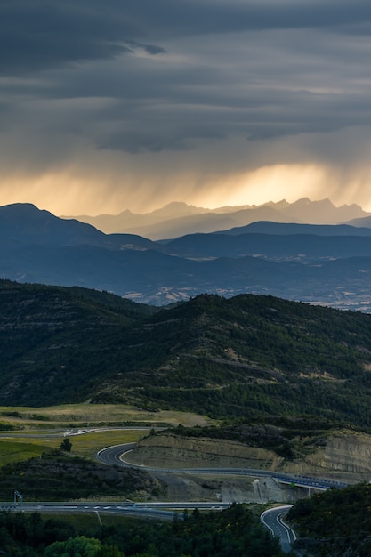 Dramatic sunset over Pyrenees mountains peaks