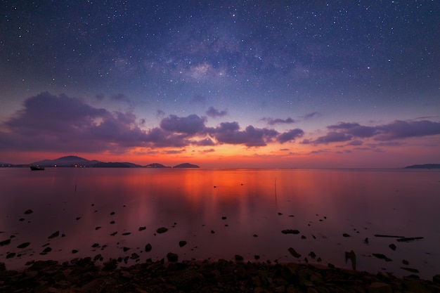 dramatic sunset or sunrise, sky clouds over sea 