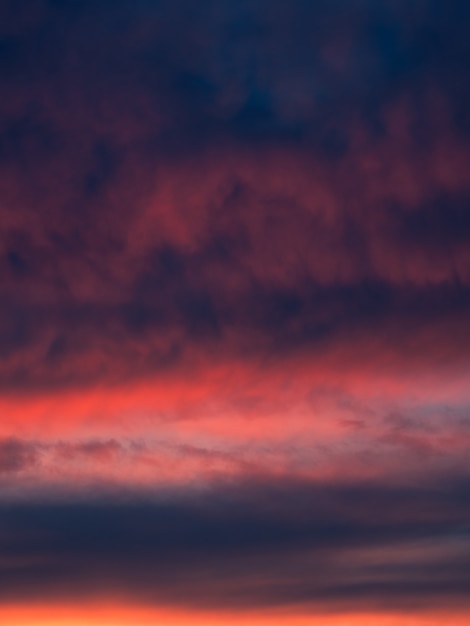 Dramatic sunset with dark color of the sky and clouds