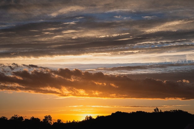 Dramatic sunset with twilight color sky and clouds