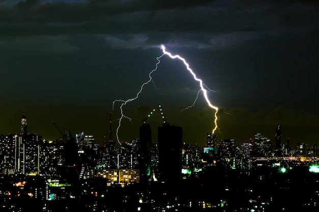 Dramatic thunder storm in the city at night