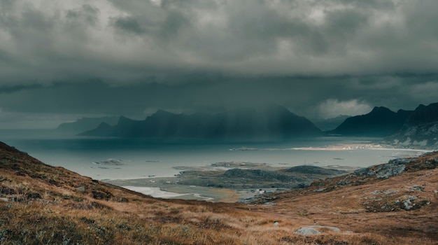 Dramatic view, heavy rain over the north sea in polar norway, view from the mountains in the Lofoten islands