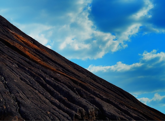 Dramatic volcanic mountain slope landscape background