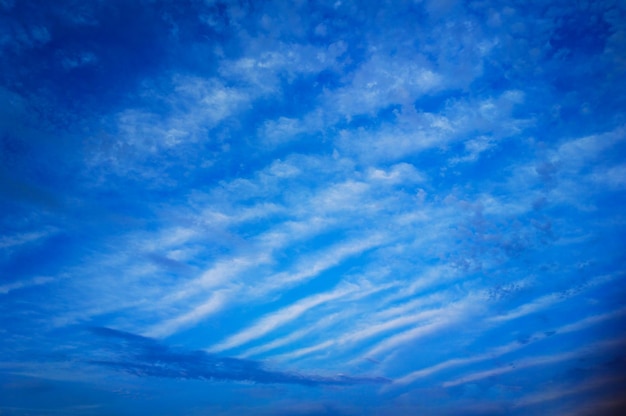 Dramatic white clouds in blue sky background