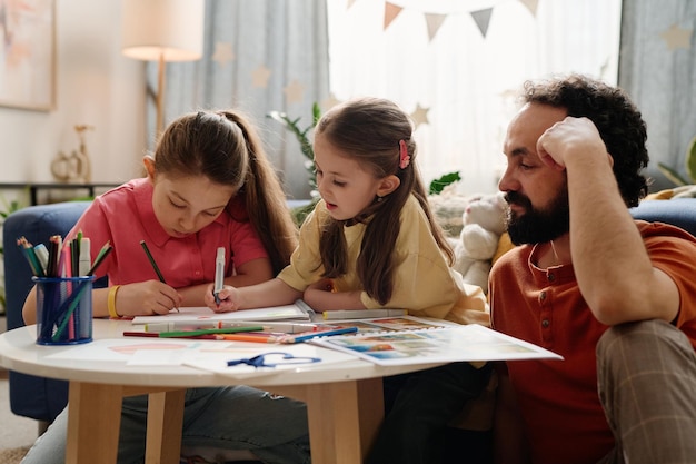 Drawing and Coloring with Parent in Cozy Living Room