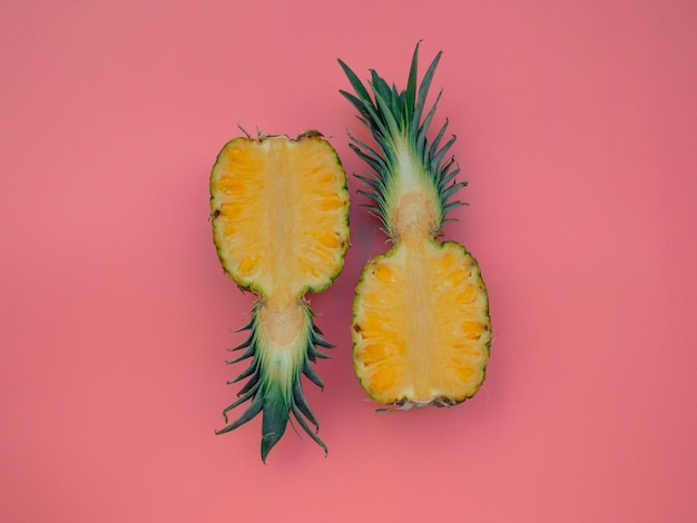 A drawing of pineapples on a pink background