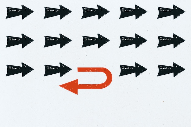 drawing red rotates and many black arrows on white wall