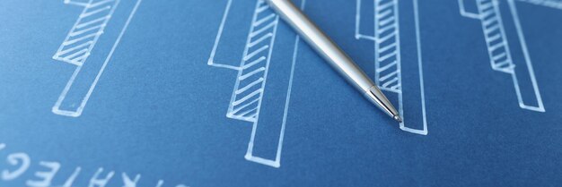 Drawn financial business analytics chart and pen